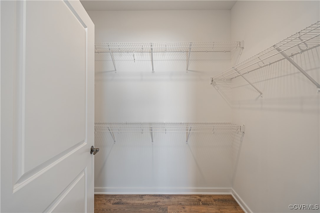 6649 Mayland Ridge Lane Moseley, VA 23120 - Photo 28 of 32 a view of a room with racks on the wall