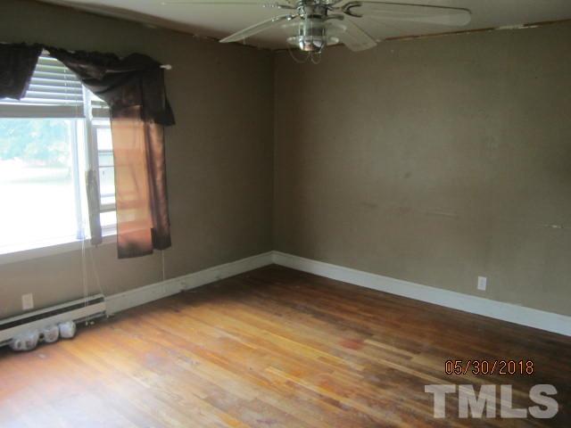595 Providence Road Roxboro, NC 27573 - Photo 11 of 14 an empty room with a window