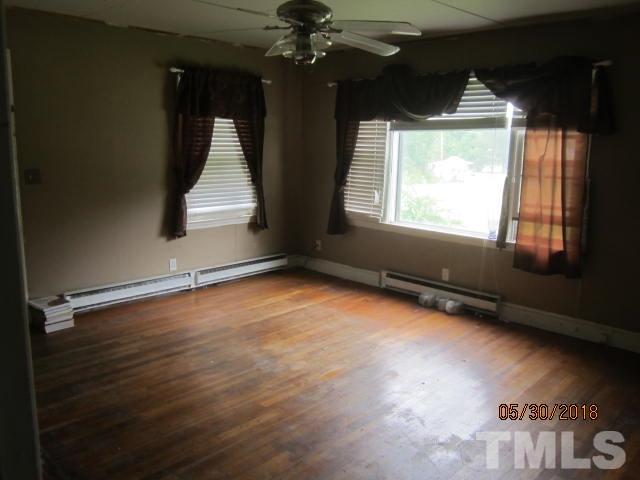 595 Providence Road Roxboro, NC 27573 - Photo 9 of 14 a view of an empty room with a window