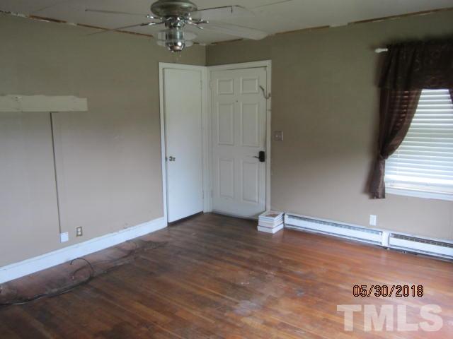 595 Providence Road Roxboro, NC 27573 - Photo 10 of 14 a view of an empty room with a window