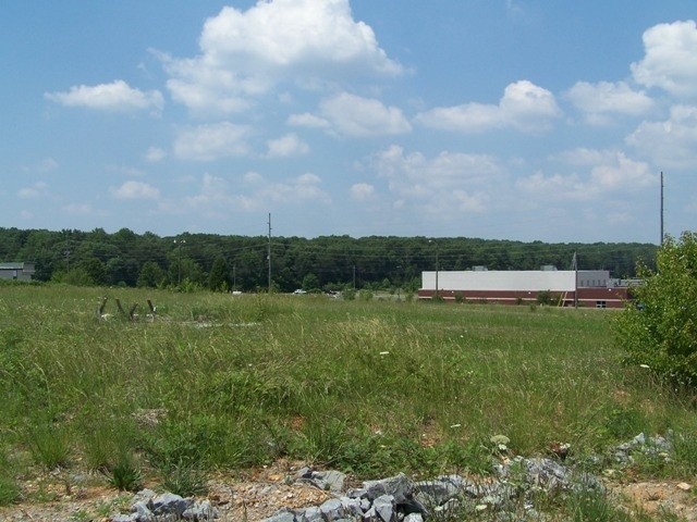 0 Stuart Road Northeast Cleveland, TN 37312 - Photo 2 of 4 a view of a field of grass and trees