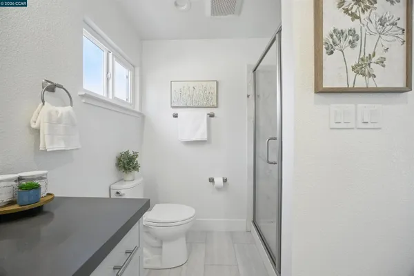a bathroom with a sink double vanity and a tub