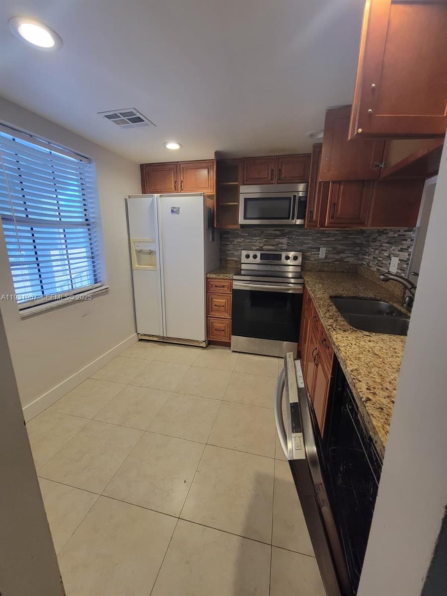 4321 Northwest 9th Avenue, Unit 102 Deerfield Beach, FL 33064 - Photo 4 of 34