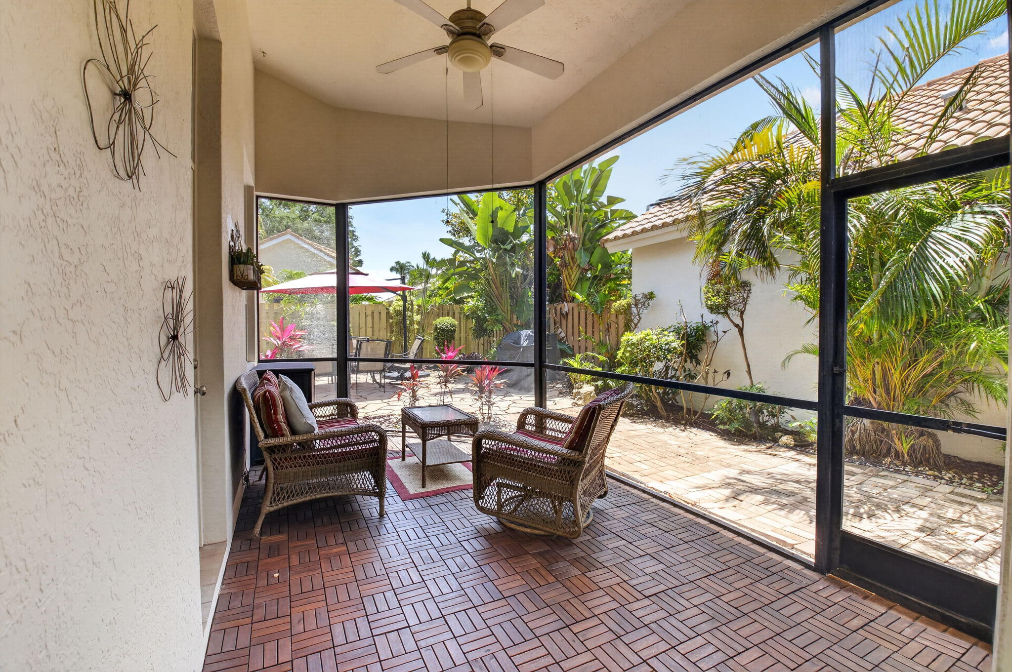 6694 Northwest 26th Way Boca Raton, FL 33496 - Photo 33 of 58 a view of a porch with furniture