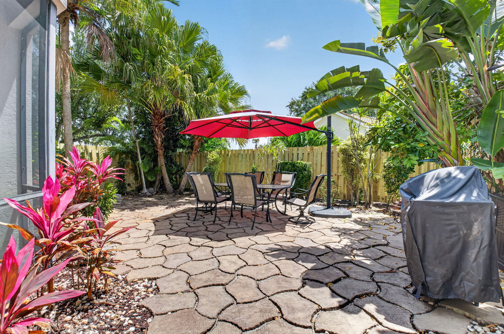 6694 Northwest 26th Way Boca Raton, FL 33496 - Photo 35 of 58 an outdoor space with patio