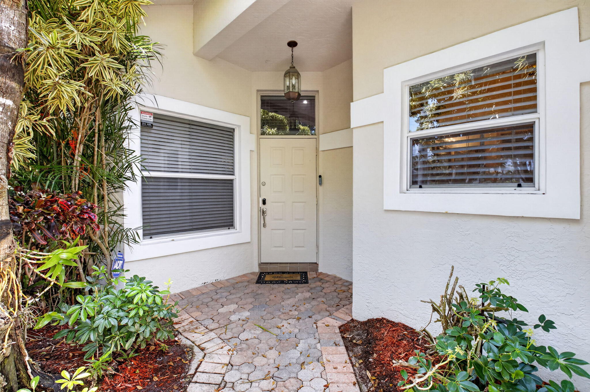 6694 Northwest 26th Way Boca Raton, FL 33496 - Photo 5 of 58 a front view of a house