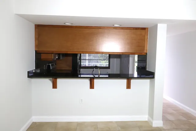 a picture of a room with wooden floor