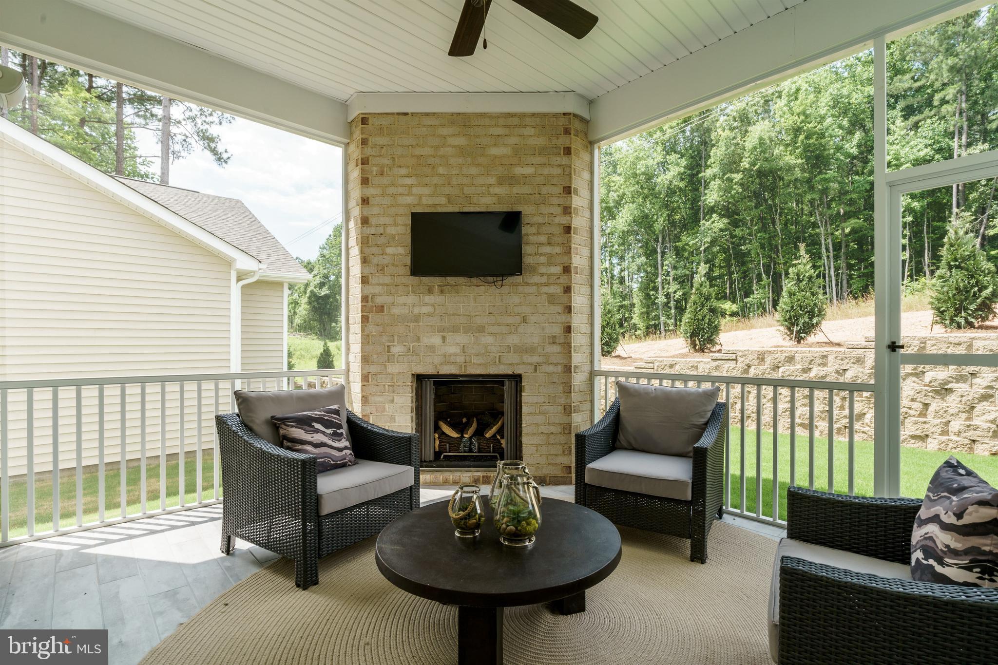 Tbb West Aster Way, Unit VIRTUOSO Gettysburg, PA 17325 - Photo 34 of 51 a living room with furniture and a fireplace
