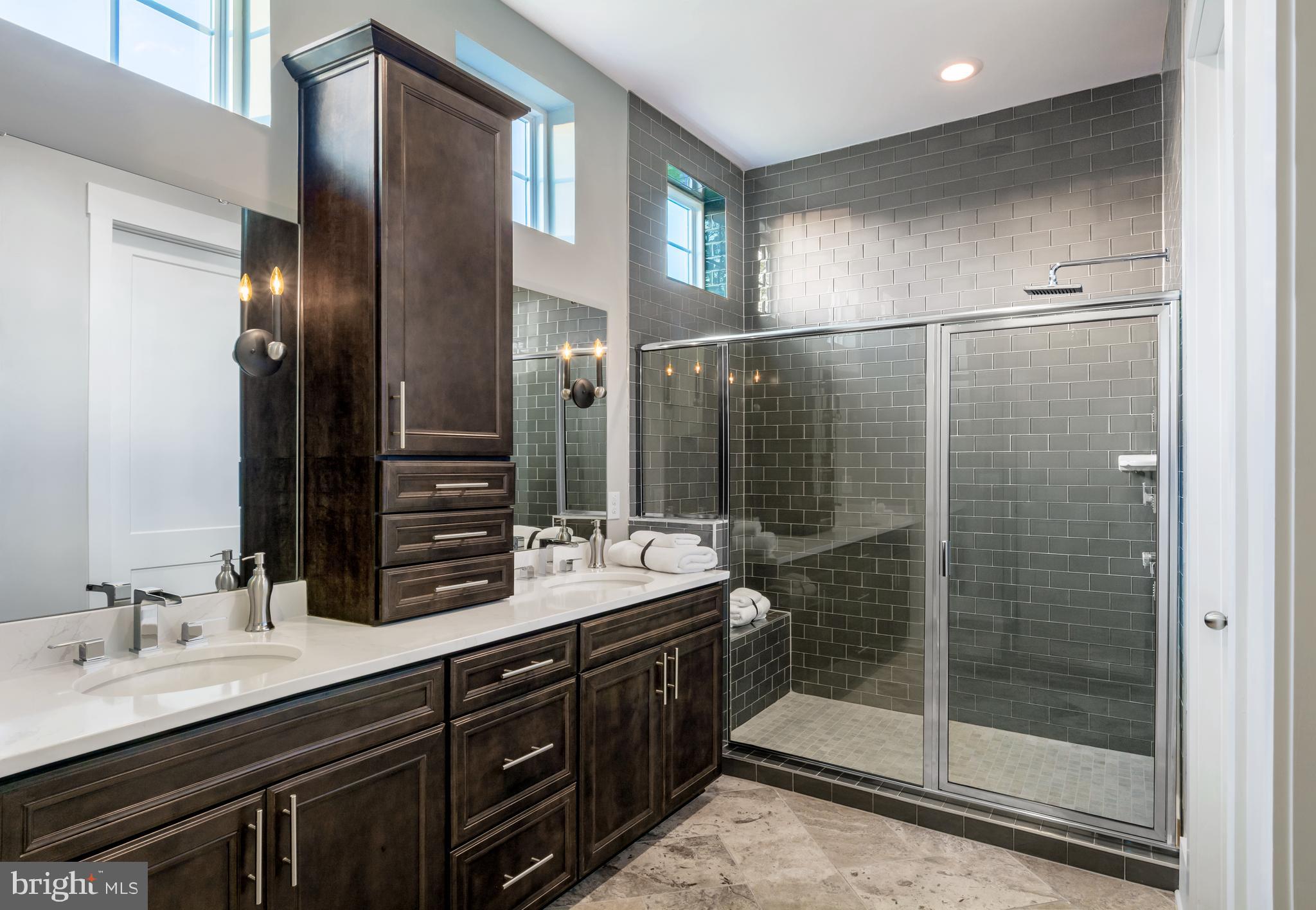 Tbb West Aster Way, Unit VIRTUOSO Gettysburg, PA 17325 - Photo 36 of 51 a bathroom with a double vanity sink mirror and shower