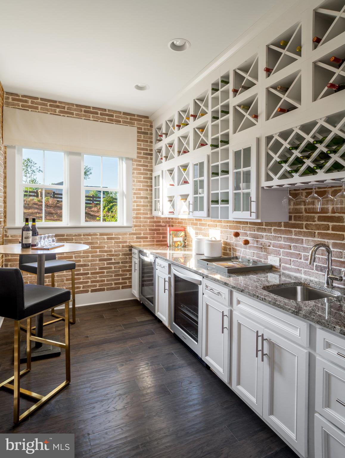 Tbb West Aster Way, Unit VIRTUOSO Gettysburg, PA 17325 - Photo 37 of 51 a kitchen with stainless steel appliances a sink and cabinets