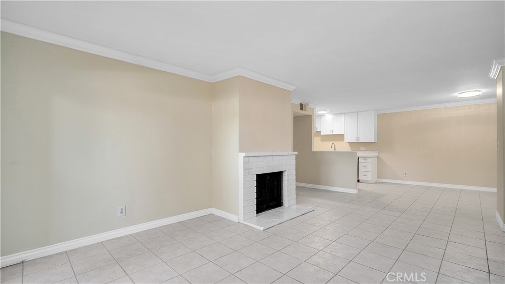 17522 Vandenberg Lane, Unit 3 Tustin, CA 92780 - Photo 16 of 27 a view of empty room with wooden floor