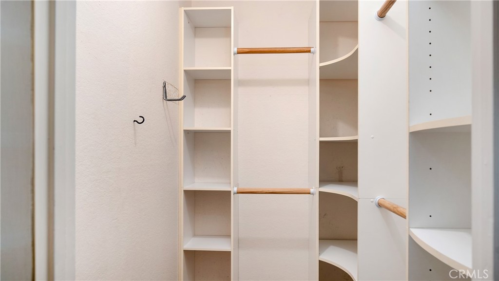 17522 Vandenberg Lane, Unit 3 Tustin, CA 92780 - Photo 25 of 27 a bathroom with a bathtub and shower