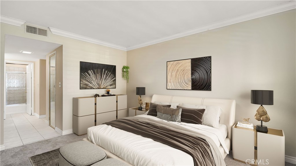 17522 Vandenberg Lane, Unit 3 Tustin, CA 92780 - Photo 3 of 27 a bedroom with a bed and a lamp on dresser