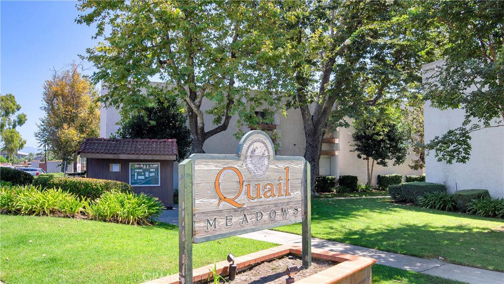 17522 Vandenberg Lane, Unit 3 Tustin, CA 92780 - Photo 4 of 27 a front view of a house with garden