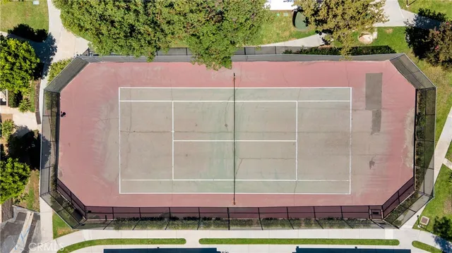 an aerial view of a house with a swimming pool