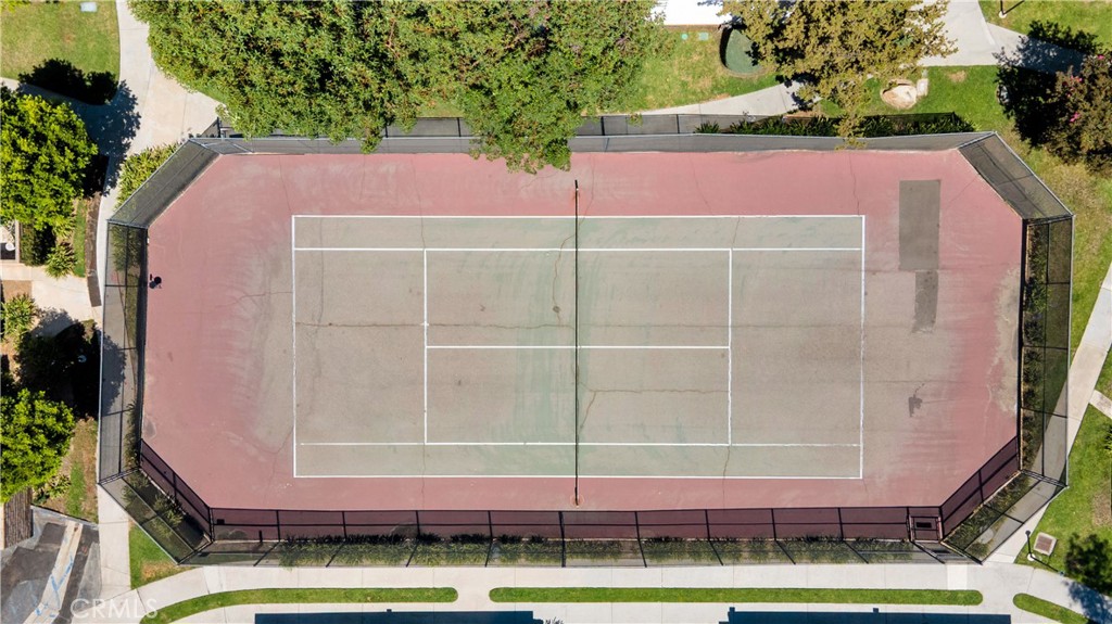 17522 Vandenberg Lane, Unit 3 Tustin, CA 92780 - Photo 9 of 27 an aerial view of a house with a swimming pool