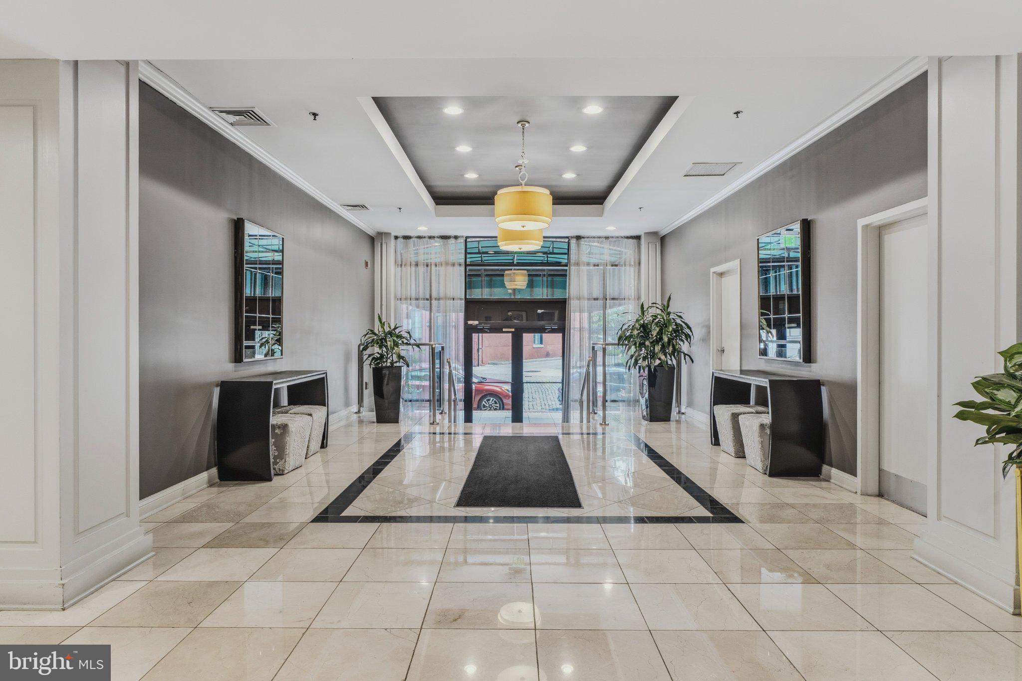 960 Fell Street, Unit 308 Baltimore, MD 21231 - Photo 4 of 38 Elegant lobby with modern design.