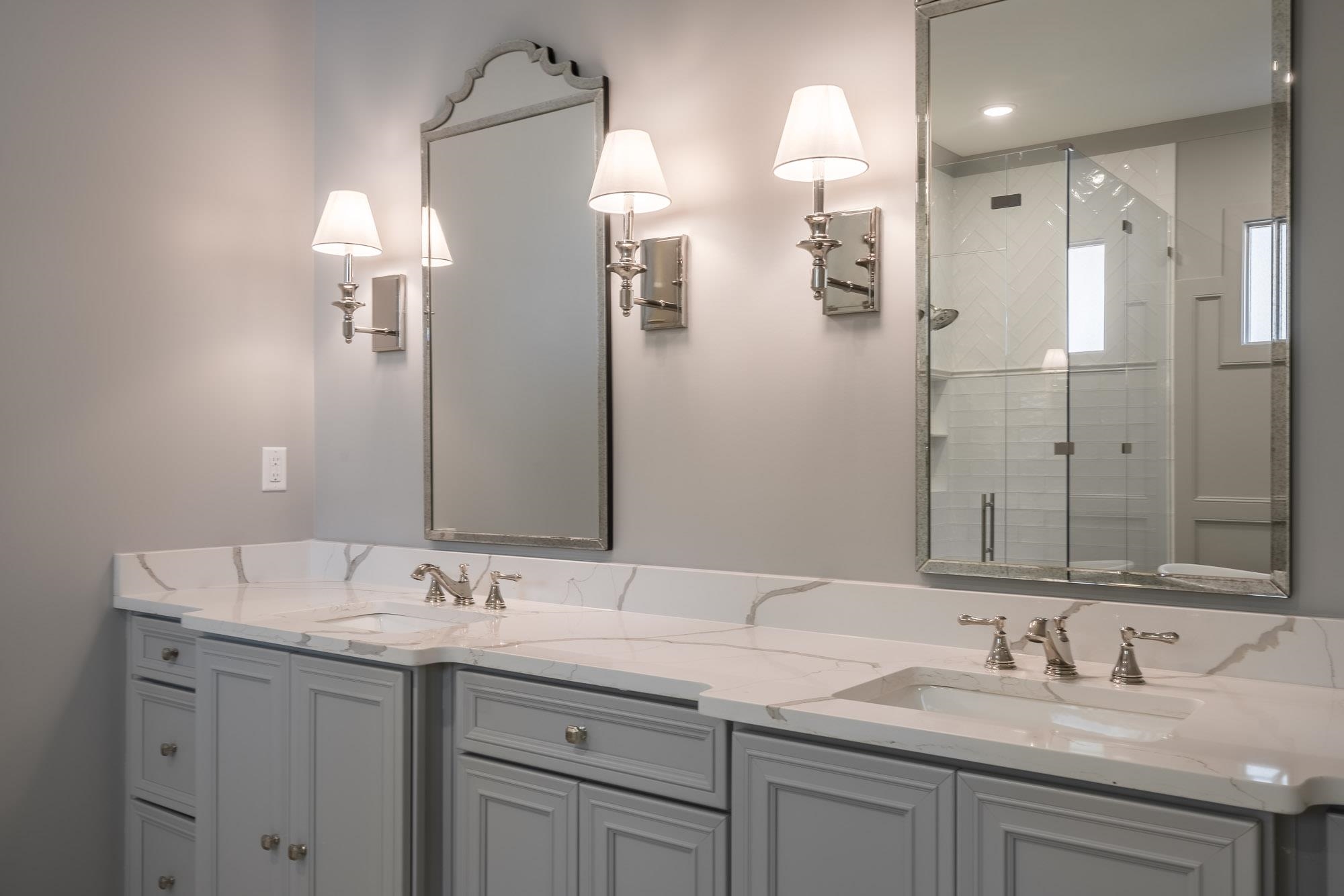 4099 Barfield Road Memphis, TN 38117 - Photo 11 of 25 a bathroom with a double vanity sink and a mirror