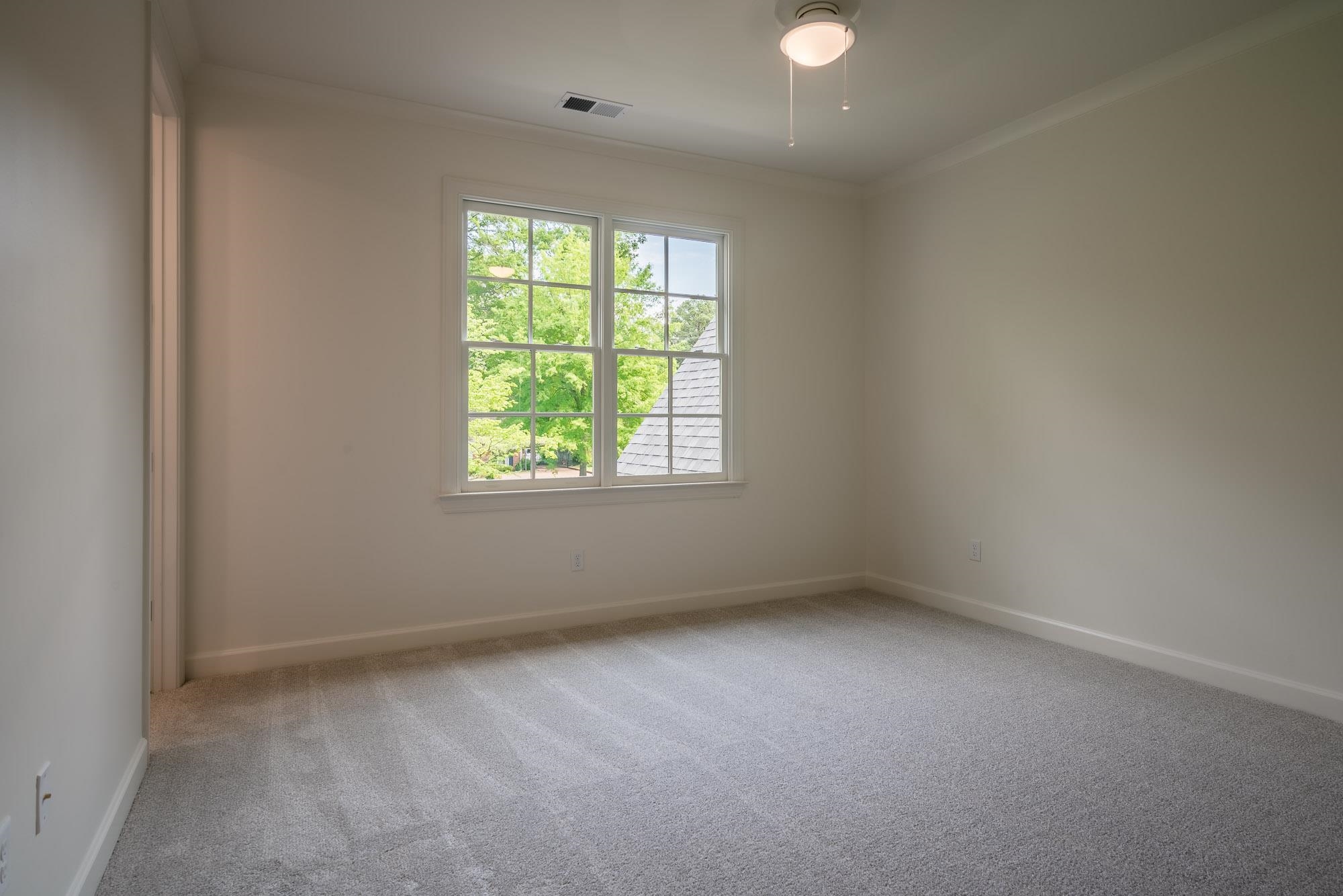 4099 Barfield Road Memphis, TN 38117 - Photo 17 of 25 an empty room with a window