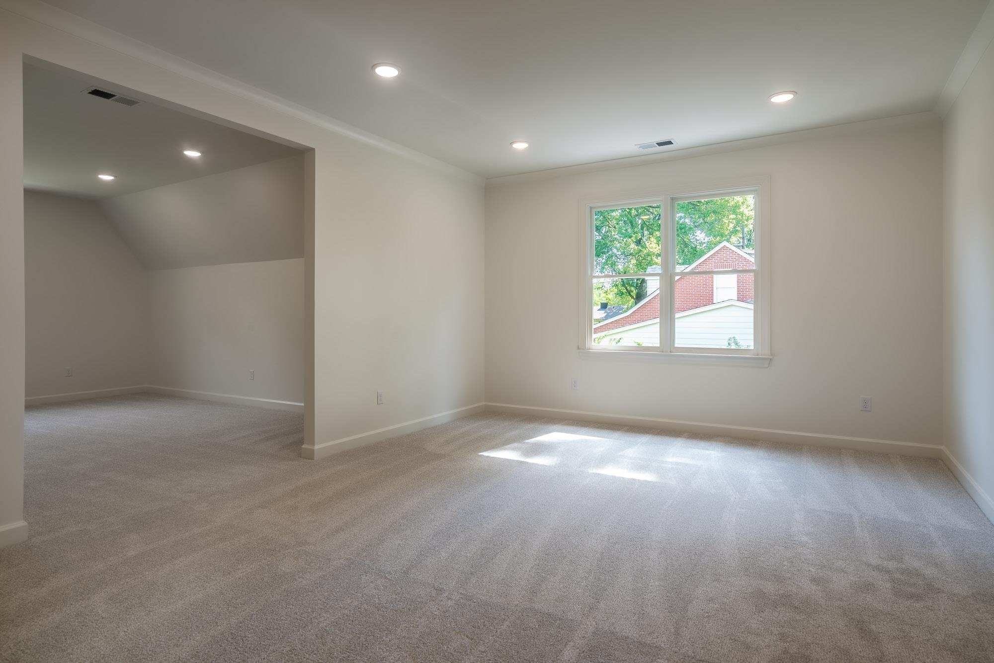 4099 Barfield Road Memphis, TN 38117 - Photo 18 of 25 an empty room with windows and closet