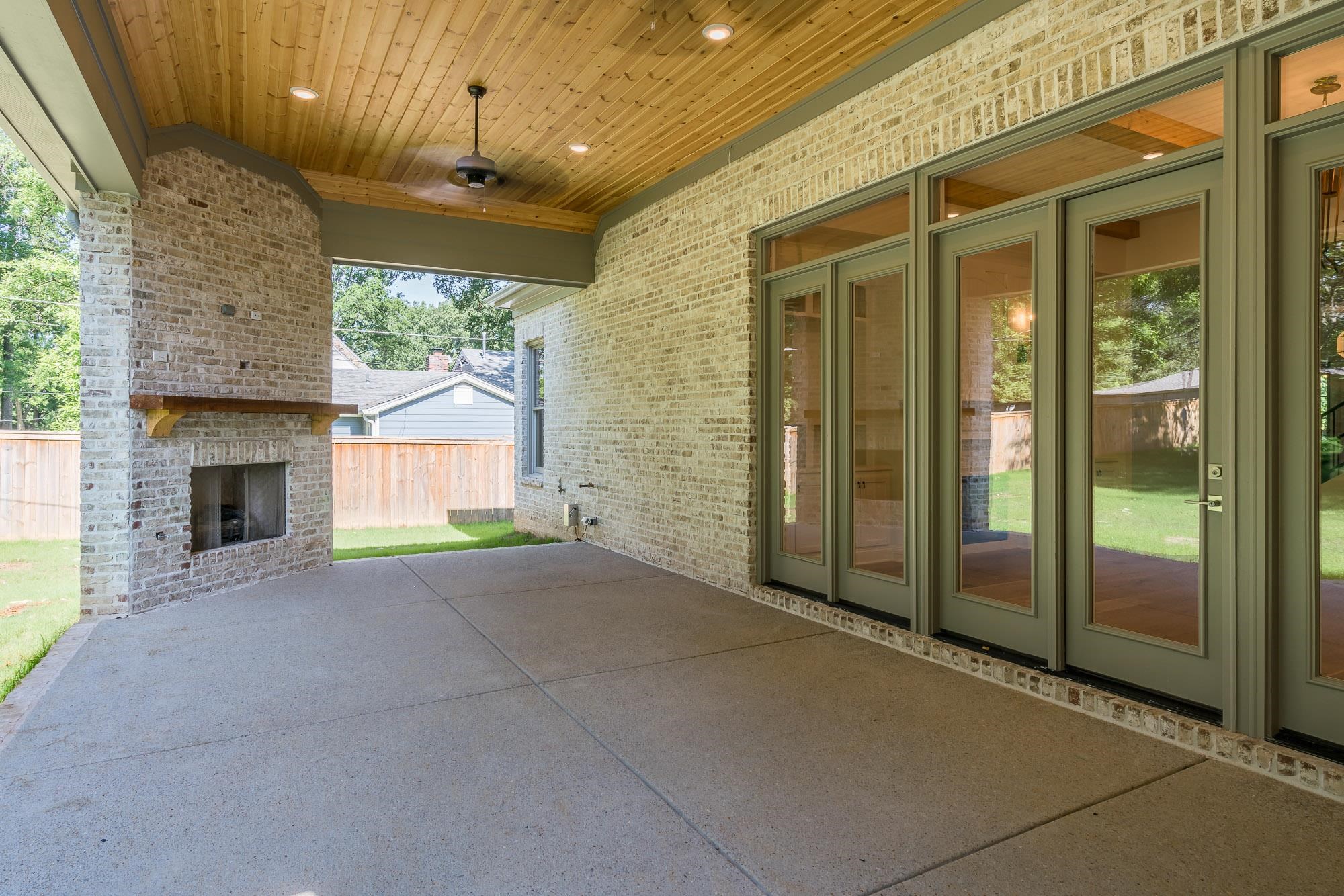 4099 Barfield Road Memphis, TN 38117 - Photo 25 of 25 a view of an empty room with a fireplace and a window