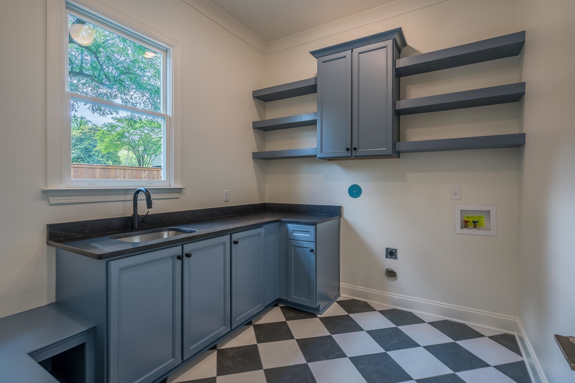 4099 Barfield Road Memphis, TN 38117 - Photo 9 of 25 a kitchen with a sink and a window