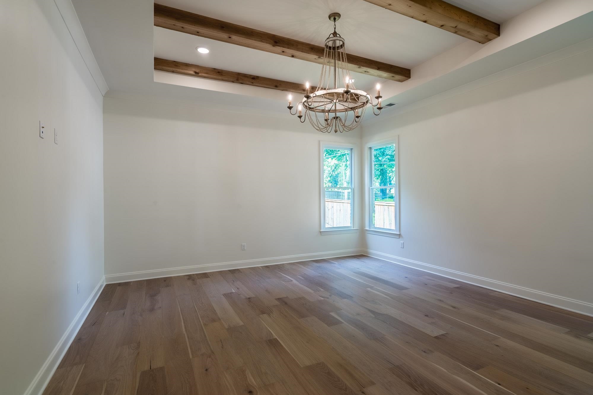 4099 Barfield Road Memphis, TN 38117 - Photo 10 of 25 wooden floor in an empty room with a window