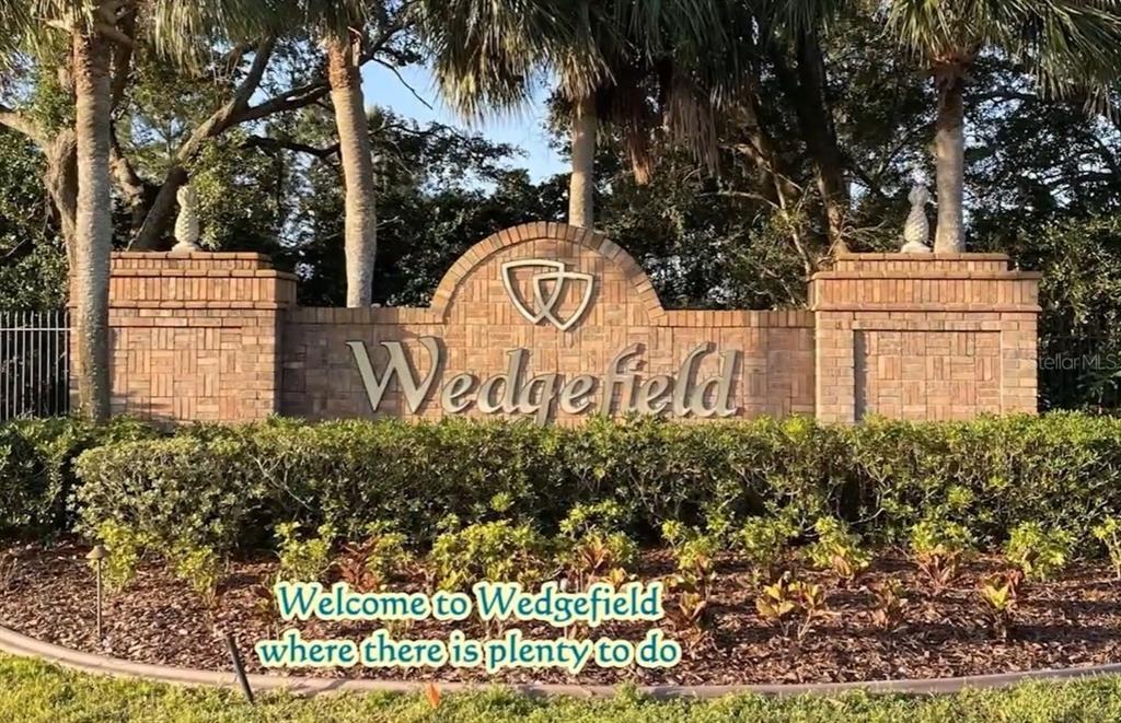 32 Starry Street Orlando, FL 32833 - Photo 4 of 8 a sign that is on the side of the road