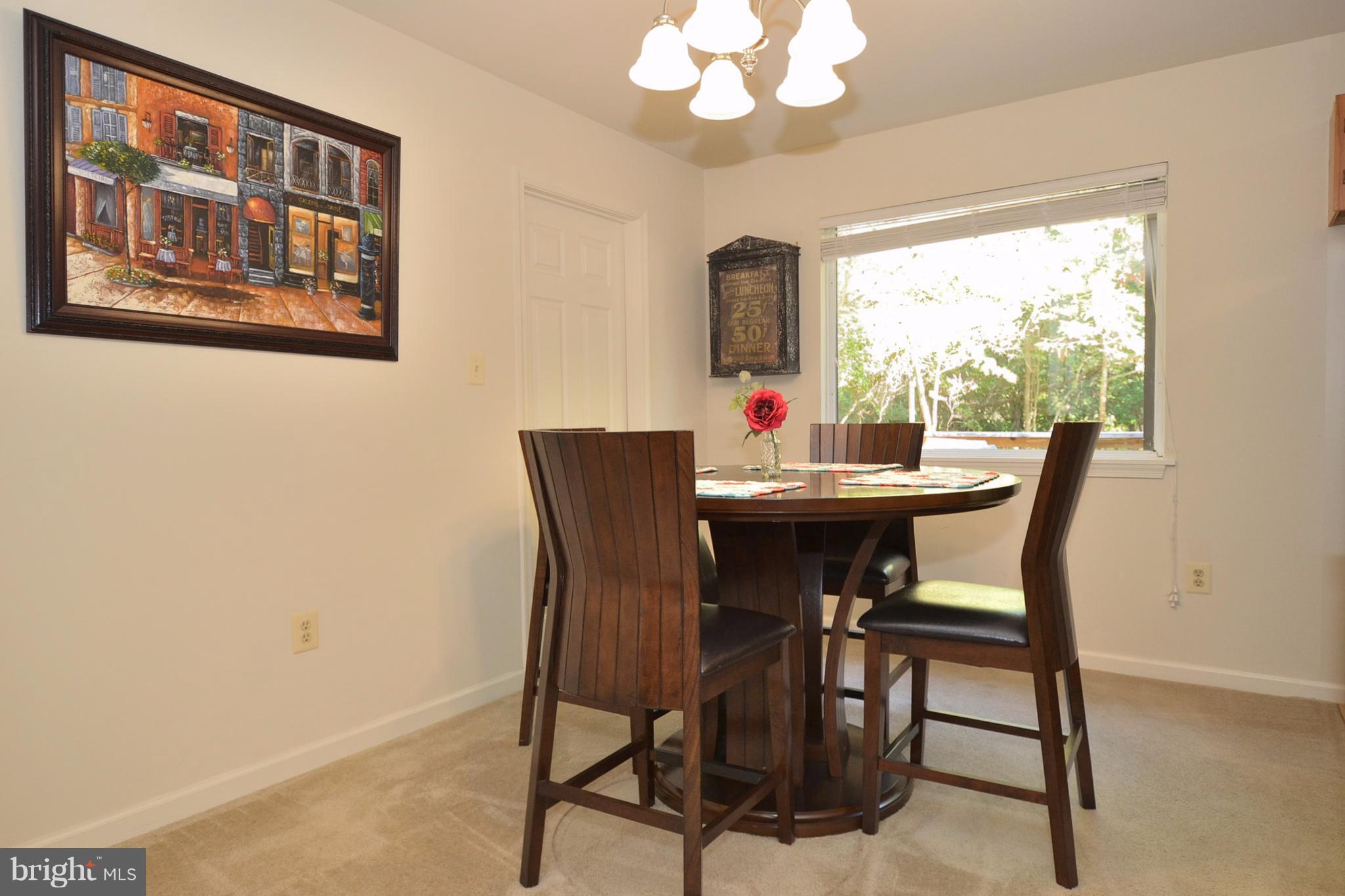 48126 Post Oak Road St. Inigoes, MD 20684 - Photo 7 of 16 Dining Area w/ picture window view of wooded lot.