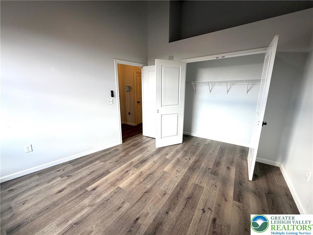 810 Monocacy Street, Unit 303 Bethlehem, PA 18018 - Photo 11 of 24 a view of an empty room and wooden floor