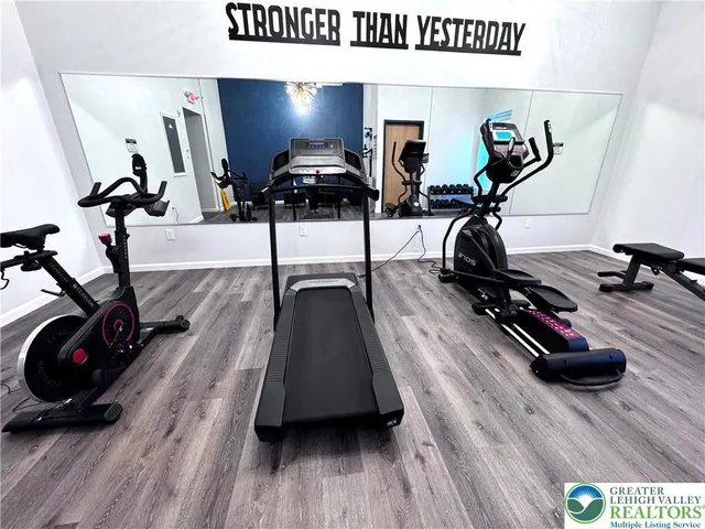 a view of a room with gym equipment