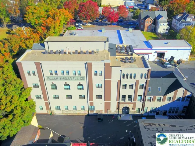 a front view of a building with outdoor area
