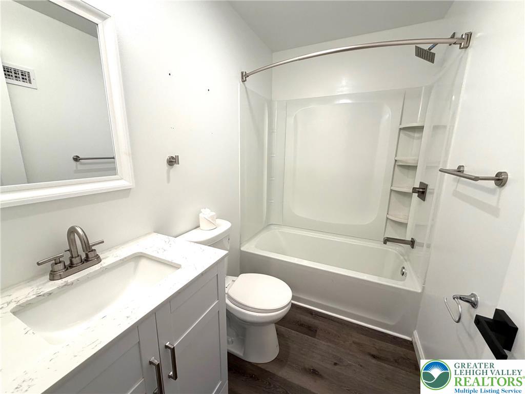 810 Monocacy Street, Unit 303 Bethlehem, PA 18018 - Photo 9 of 24 a bathroom with a sink a toilet and a bathtub
