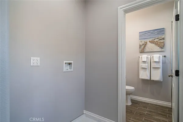 a bathroom with a toilet a sink and a bathtub