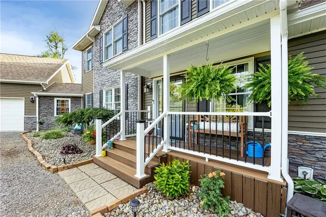 a house view with a garden space