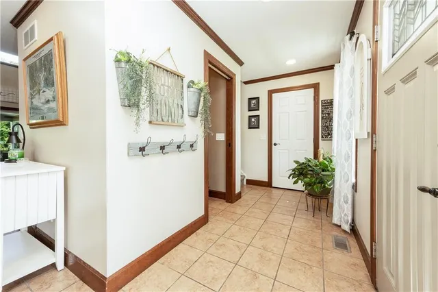 a living room with furniture and a table