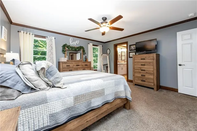 a spacious bathroom with a granite countertop sink and a mirror