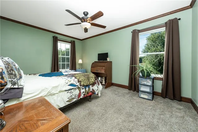 a bathroom with a sink vanity mirror and toilet