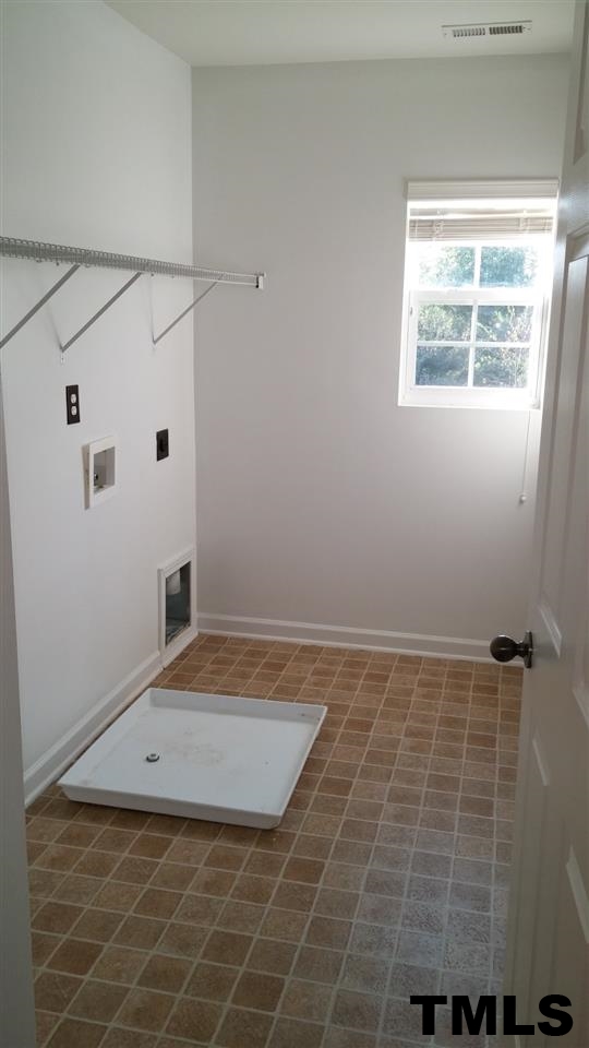 189 Depot Ridge Road Garner, NC 27529 - Photo 15 of 18 Large, separate laundry space.