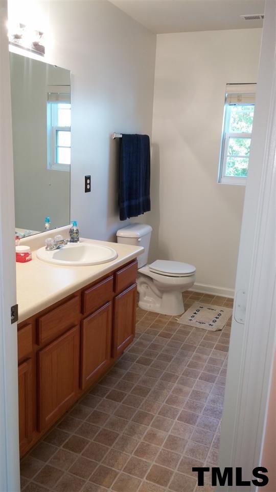189 Depot Ridge Road Garner, NC 27529 - Photo 17 of 18 Second full bathroom with plenty of storage.