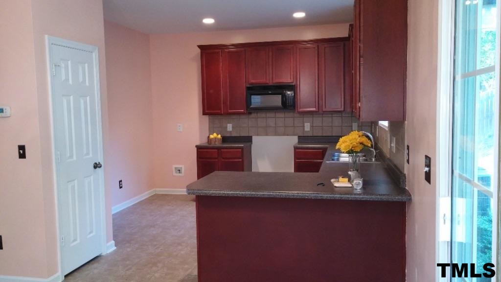 Remodeled kitchen with 42" cabinets, tile back splash.