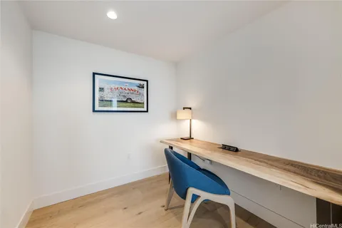 a workspace with furniture and lamp