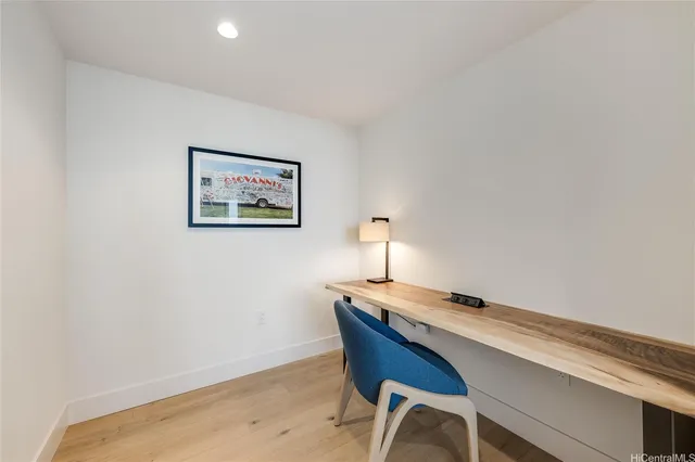 a workspace with furniture and lamp