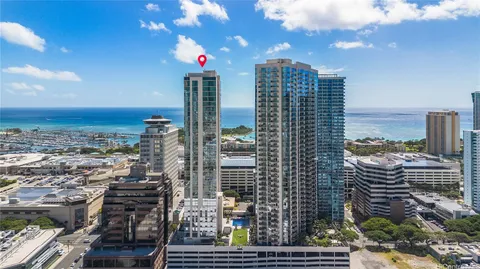 a view of a city with tall buildings