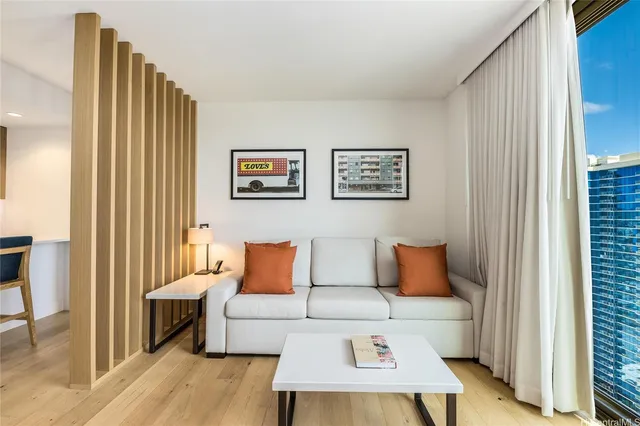 a bedroom with a bed and a couch