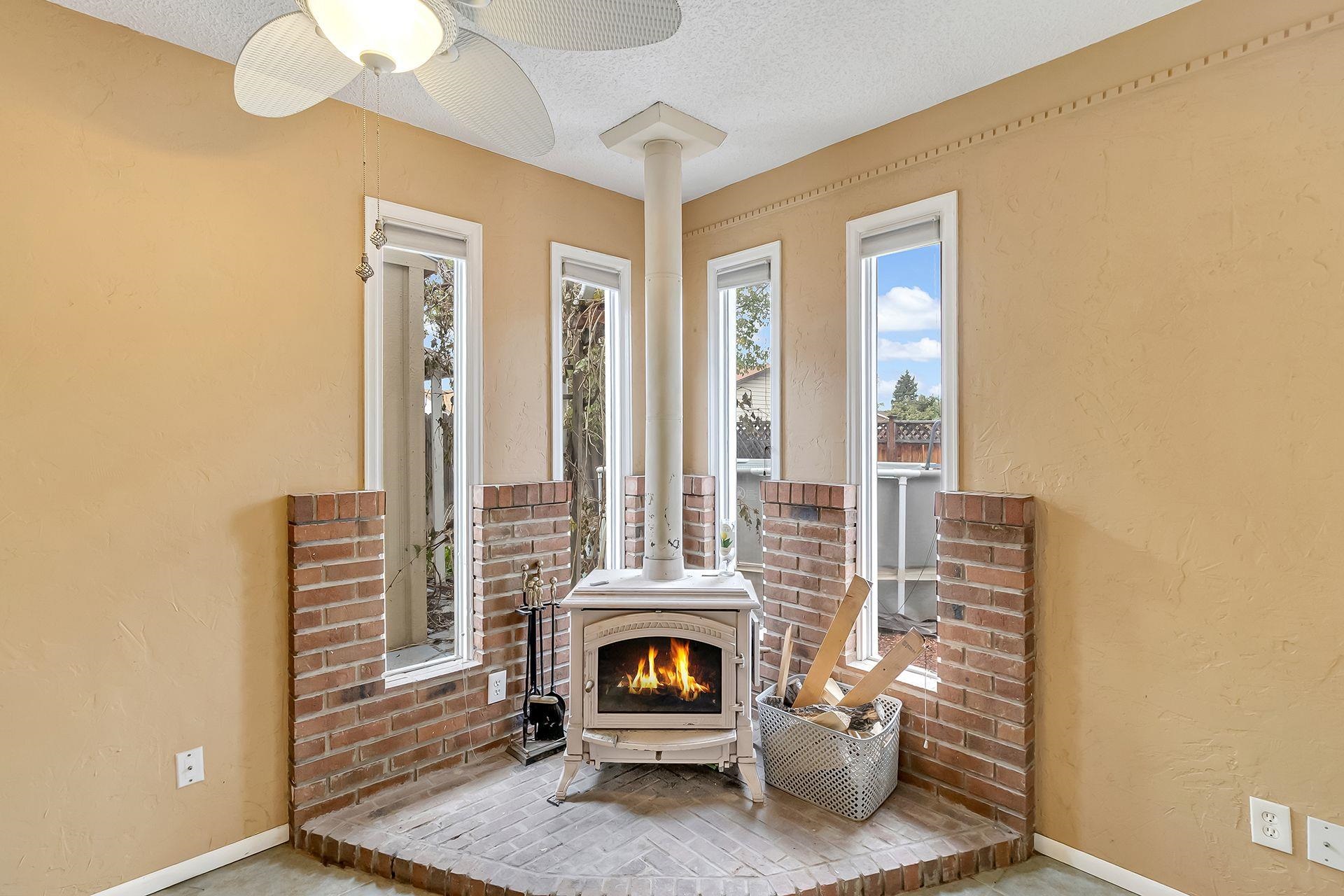 483-30 C 3/4 Road Grand Junction, CO 81504 - Photo 19 of 25 a living room with furniture and a fireplace