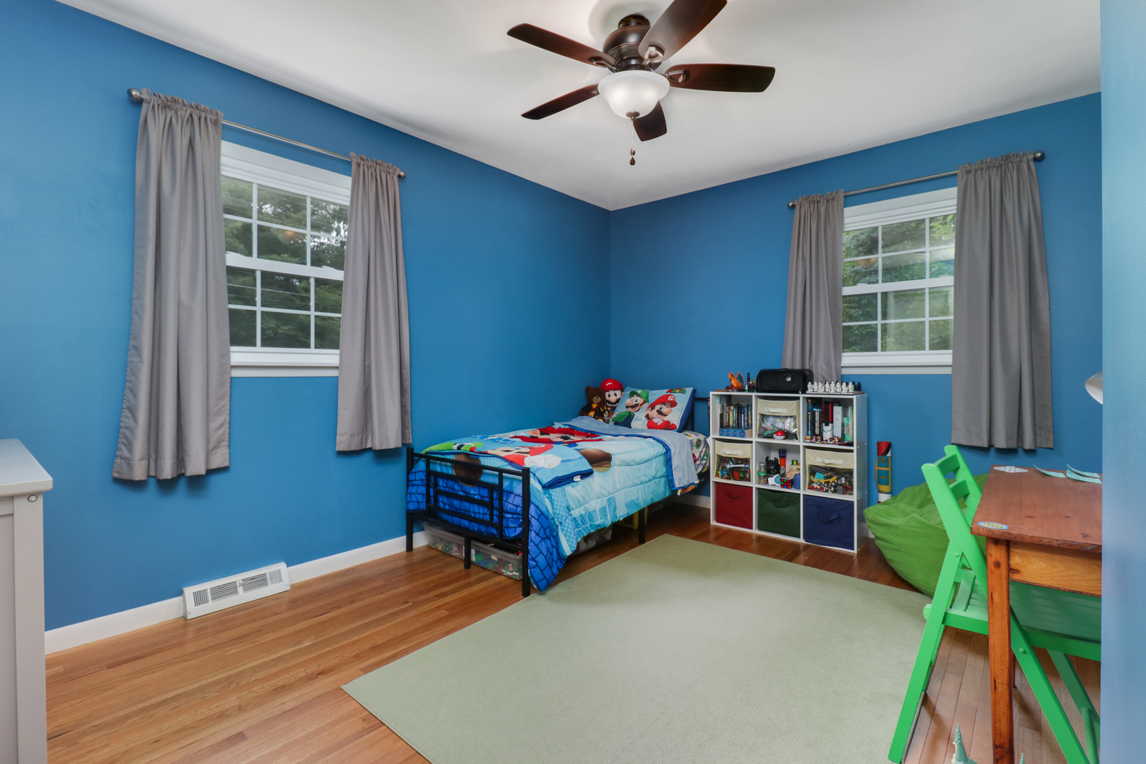 801 Spear Drive Normal, IL 61761 - Photo 17 of 41 a bedroom with a bed and a bookshelf