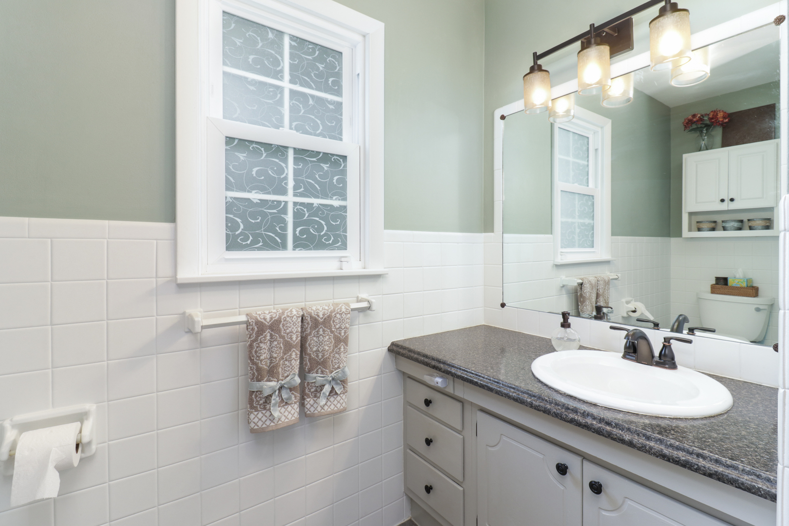 801 Spear Drive Normal, IL 61761 - Photo 20 of 41 a bathroom with a granite countertop sink and a mirror