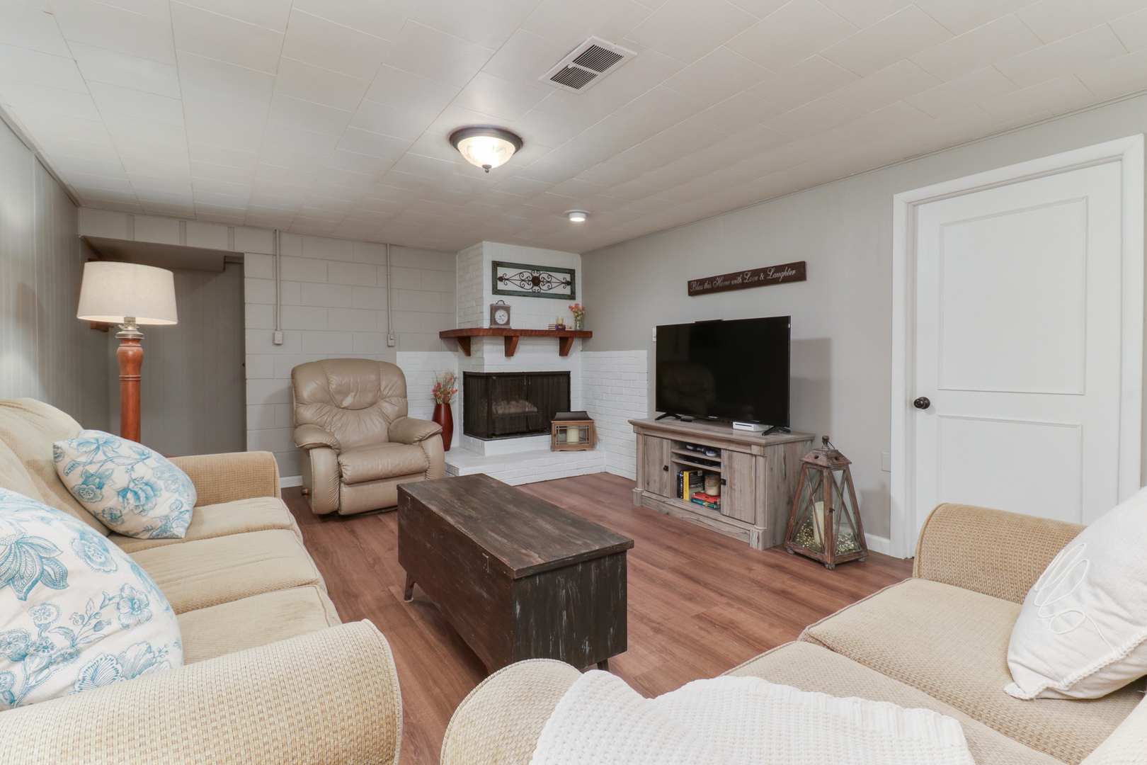 801 Spear Drive Normal, IL 61761 - Photo 26 of 41 a living room with furniture and a flat screen tv