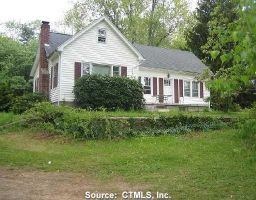 176 Wauregan Road Brooklyn, CT 06234 - Photo 1 of 1 a house view with a garden space